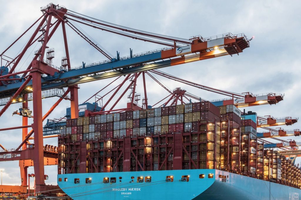 Import medicines from India: container ship at port loading export cargo for Latin America