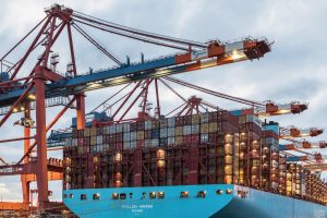 Import medicines from India: container ship at port loading export cargo for Latin America