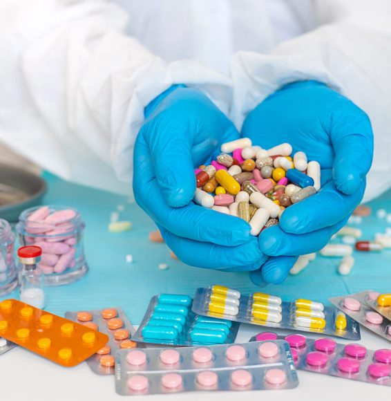 examine drugs in the laboratory. Selective focus. pills.